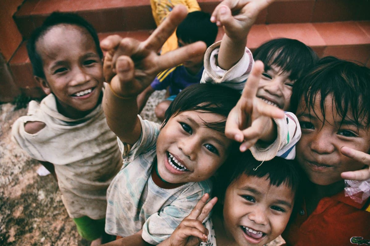 Children in a community setting, atmospheric photo not a portrait of the named pastor